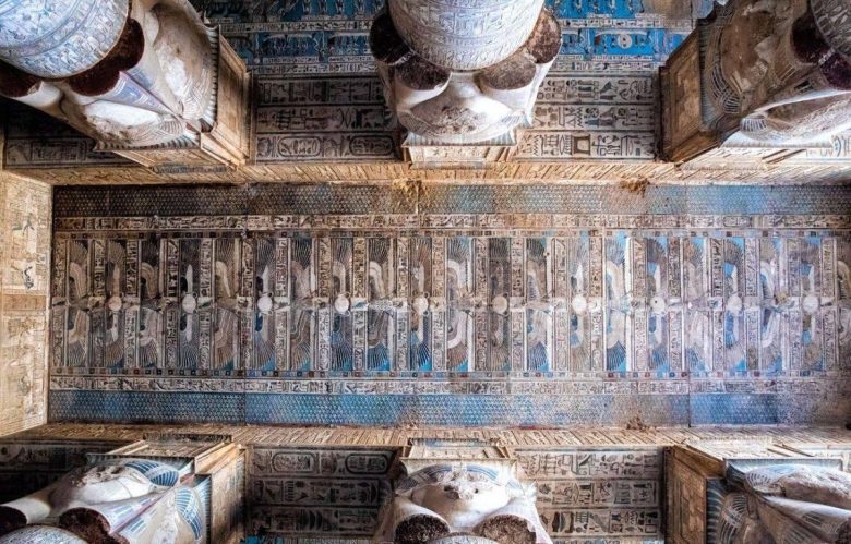 A private Luxor tour showcasing the colorful ancient ceiling inside Dendera Temple.