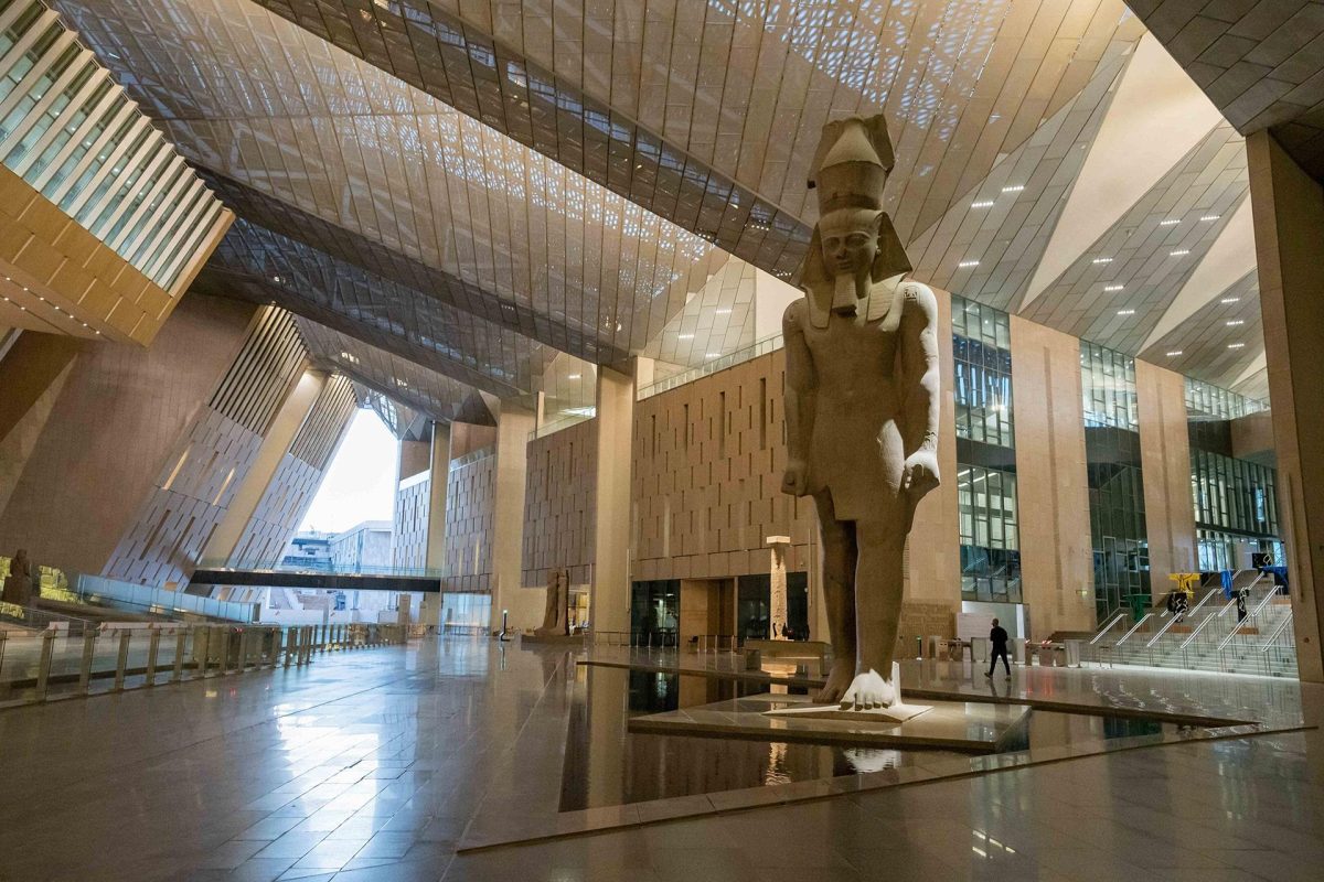 Private tour of the Grand Egyptian Museum GEM in Cairo featuring King Tutankhamun treasures and Giza Pyramid views.