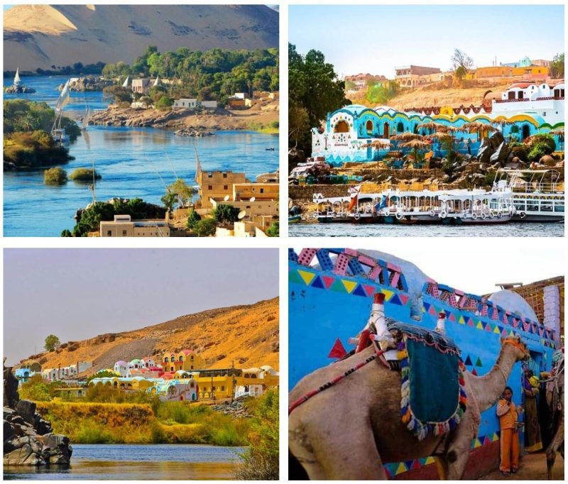 Traditional felucca sailing on the Nile near Nubian villages in Aswan, Egypt.