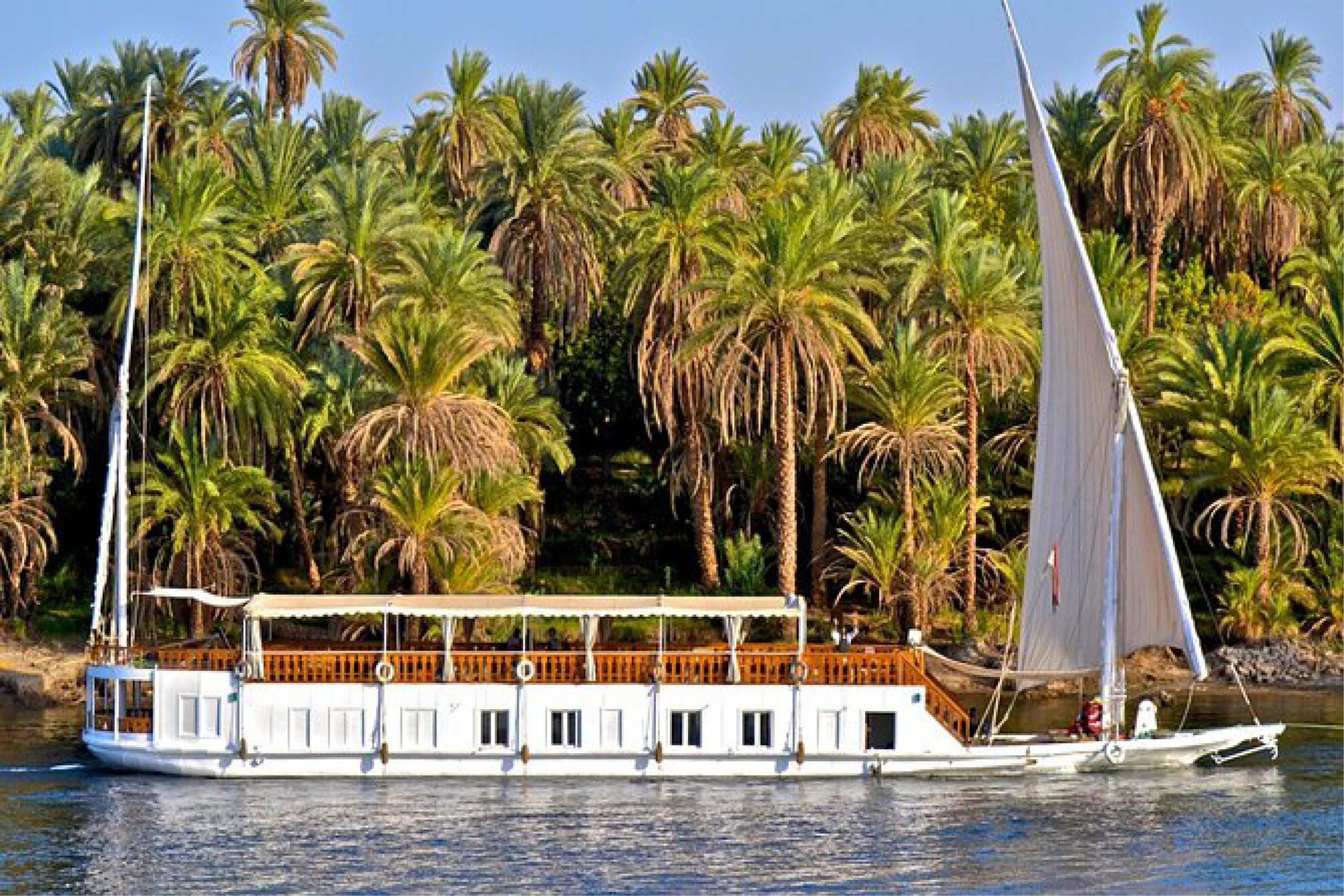 Dahabiya sailboat cruising along the Nile in Egypt