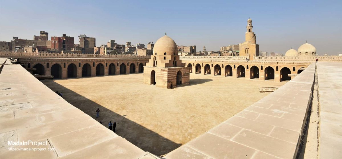 Ahmed Ibn Tulun Mosque in Cairo, Egypt showcasing its spiral minaret, courtyard, and medieval Islamic architecture