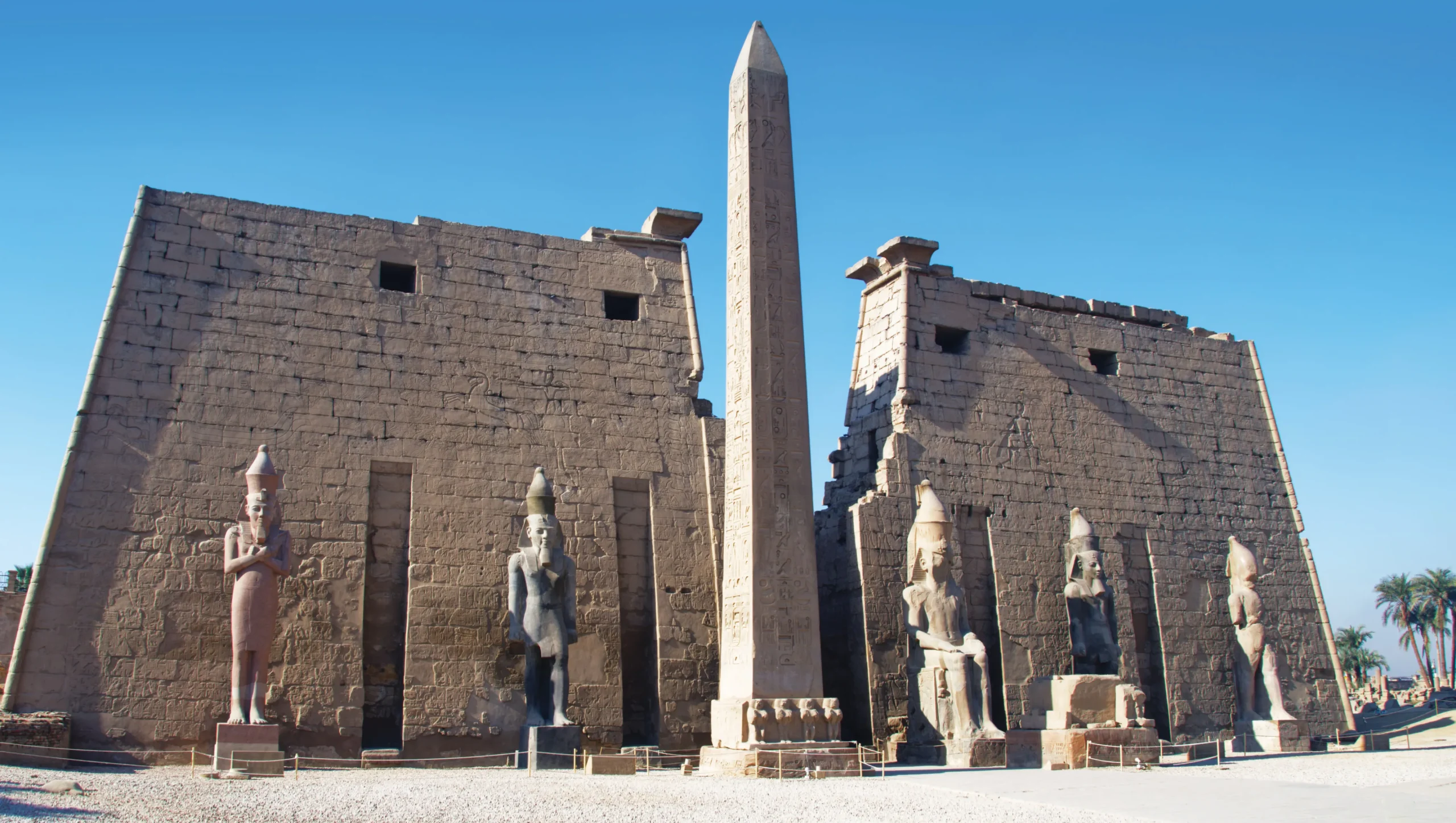 Luxor Temple in Egypt showing massive columns, statues, and carvings