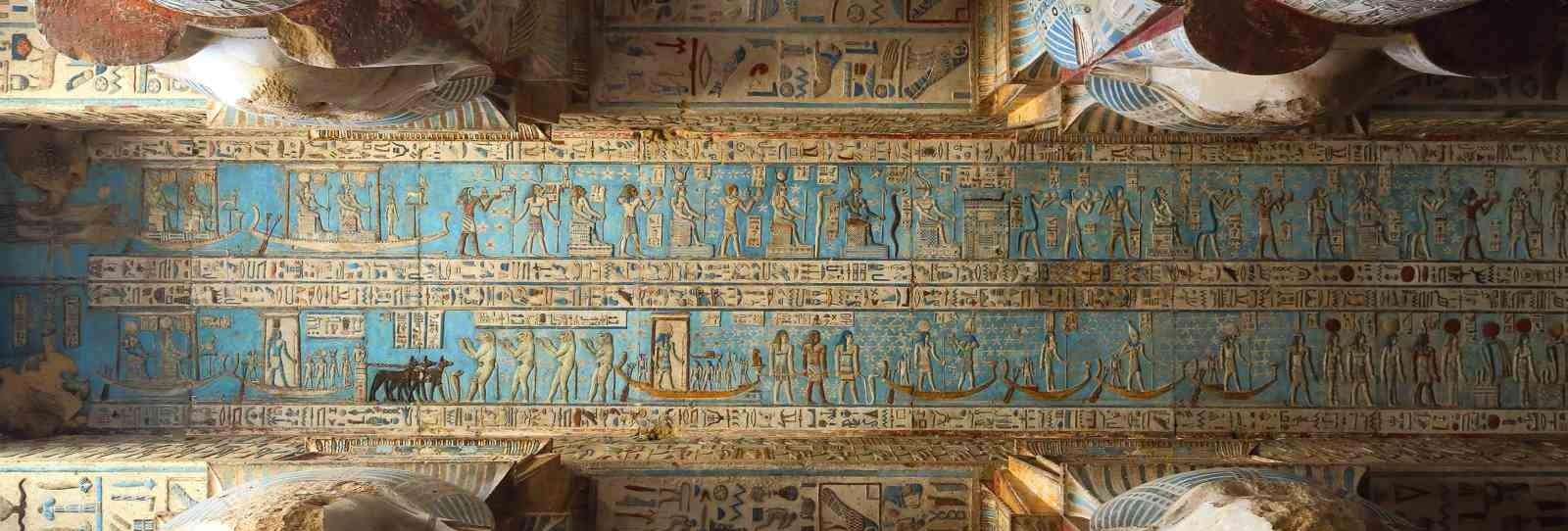 Wide view of the Dendera Temple Complex showing the well-preserved architecture and entrance to the Temple of Hathor, Egypt.