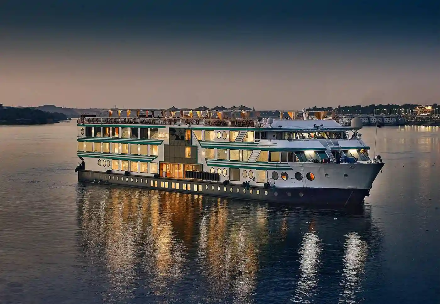 Luxury Nile cruise ship sailing on the Nile River in Egypt during a cultural tour experience with MSM Travel Egypt