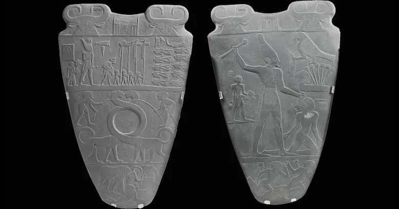 The ancient Egyptian Narmer Palette displaying carved relief scenes of King Narmer on both sides.