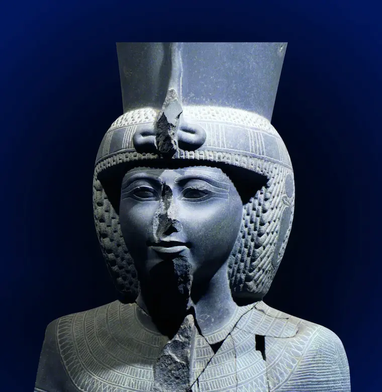 Pharaoh Ramses III depicted in ancient relief carving defending Egypt