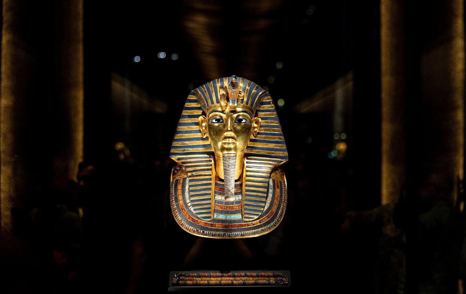 Tutankhamun golden death mask and ancient Egyptian tomb treasures from KV62