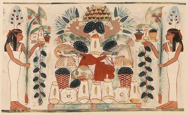 Ancient Egyptian tomb painting depicting a lavish offering table stacked with bread, roasted waterfowl, dates, and grapes, flanked by two women holding lotus flowers and offerings.